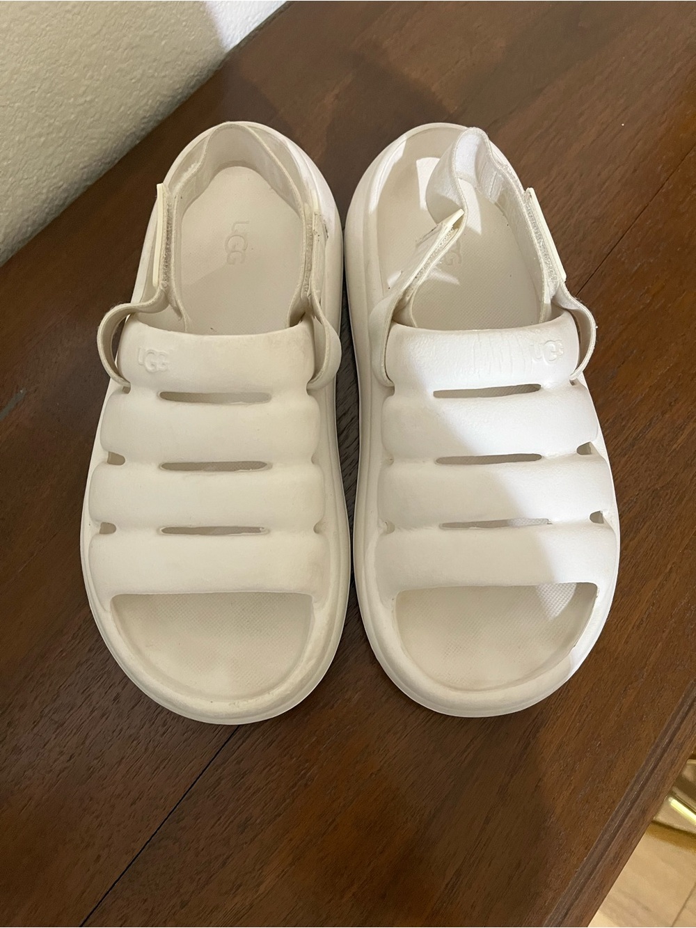 UGG women’s White Puffer-Style Slide Sandals